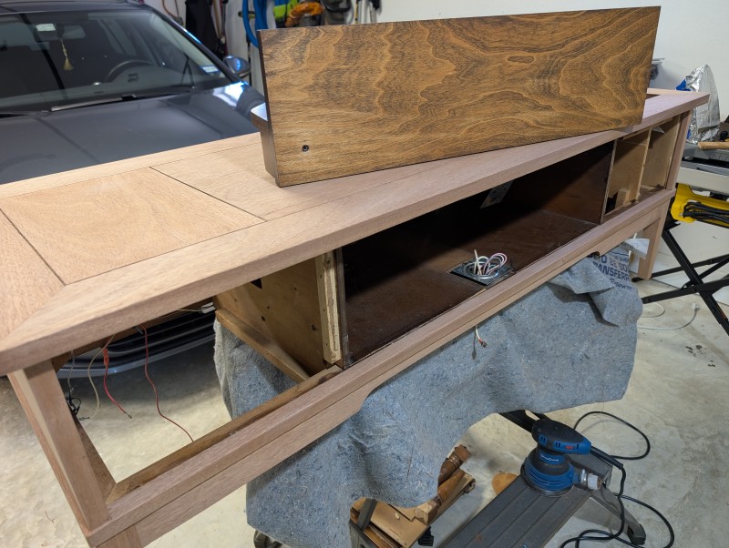 Veneered front, with non-re-veneered changer enclosure